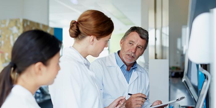 Medical staff discussing a topic together